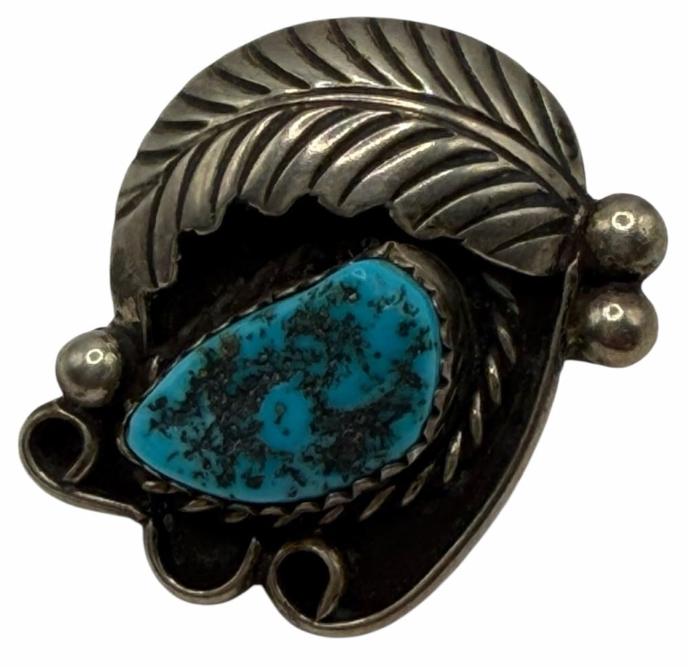 Dorothy Secatero Sterling Silver Native American Navajo Pin Brooch: Dorothy Secatero Sterling Silver Native American Navajo Pin Brooch. The back of the pin brooch is engraved with DS and features a turquoise stone accented with traditional silver leaf and raindrop det