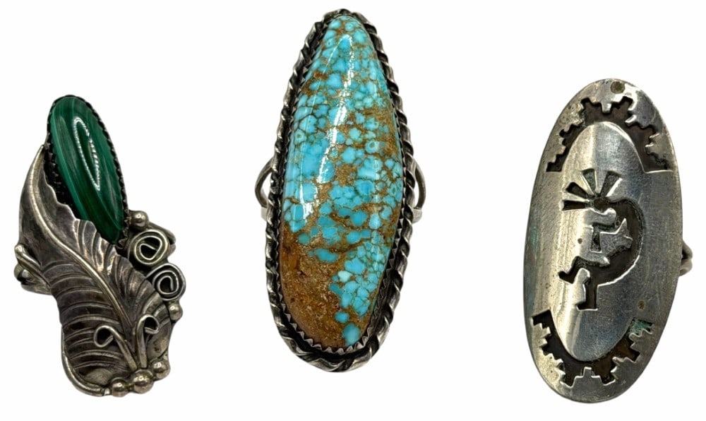 Artist Signed Sterling Silver Native American Navajo Rings: Artist Signed Sterling Silver Native American Navajo Rings. There is a Lydia Begay ring which features a cutout Kokopelli design and is a size 5.25, a Cecil Henry ring which features a Malachite stone