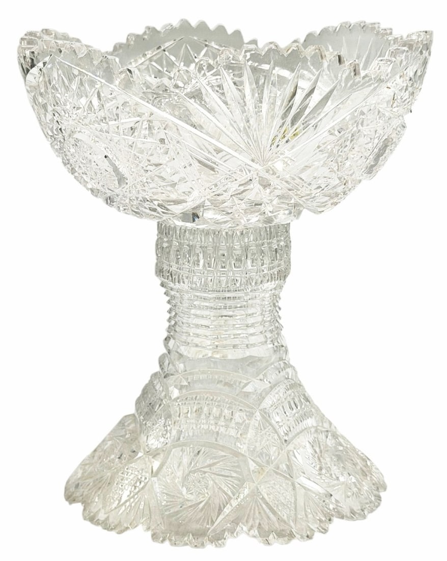 2 Piece Antique American Brilliant Period Cut Glass Bowl And Stand: 2 Piece Antique American Brilliant Period Cut Glass Bowl And Stand. The bowl and stand showcases intricate craftsmanship with deep geometric cuts and a sawtooth rim. The bowl and stand serve as a