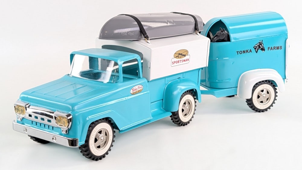 Custom Tonka Sportsman Truck w/ Horse Trailer: Custom Tonka Sportsman pickup truck with boat and horse trailer. The horse trailer has some paint flaws and a chip on the hitch area. Overall displays well. Measures approximately 21" long.