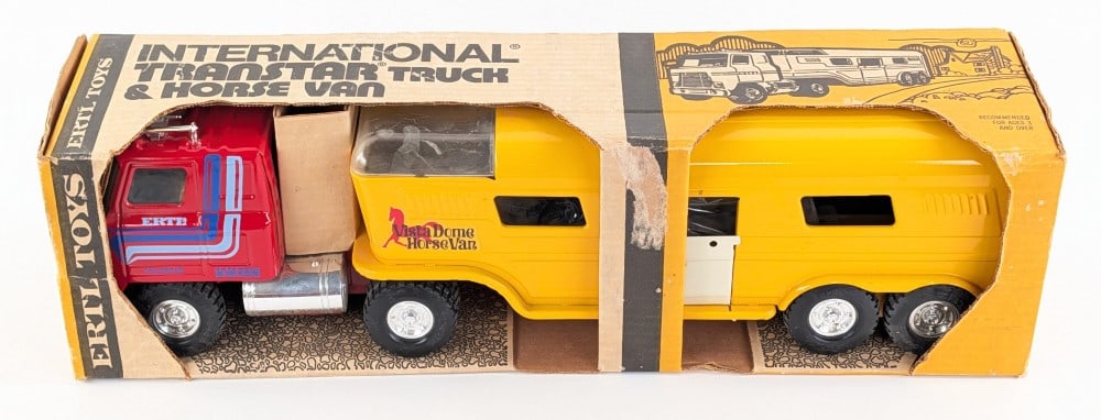 Ertl International Transtar Truck and Horse Van Trailer in Box: Ertl International Transtar truck and horse van trailer in the original box. the animals are in the trailer. The truck has some scratches to the vista dome, but overall is in very good condition. The