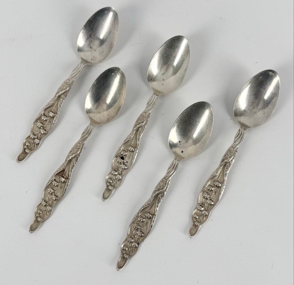 Antique 5 Pc. Sterling Silver Whiting "Lily Of The Valley" Five O'Clock Teaspoons: Antique five piece Sterling Silver Whiting five o'clock teaspoons in the "Lily Of The Valley" pattern. The spoons measure approximately? 5-3/8" long. Good condition with monograms on the back. Total