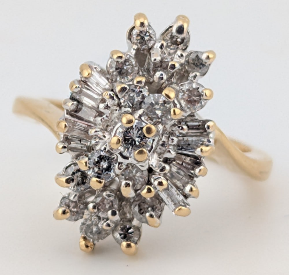 14K Gold Diamond Cluster Ring: Nice vintage 14K yellow gold ring with multi cut diamonds. Ring is size 7 and weighs 5.8 grams.