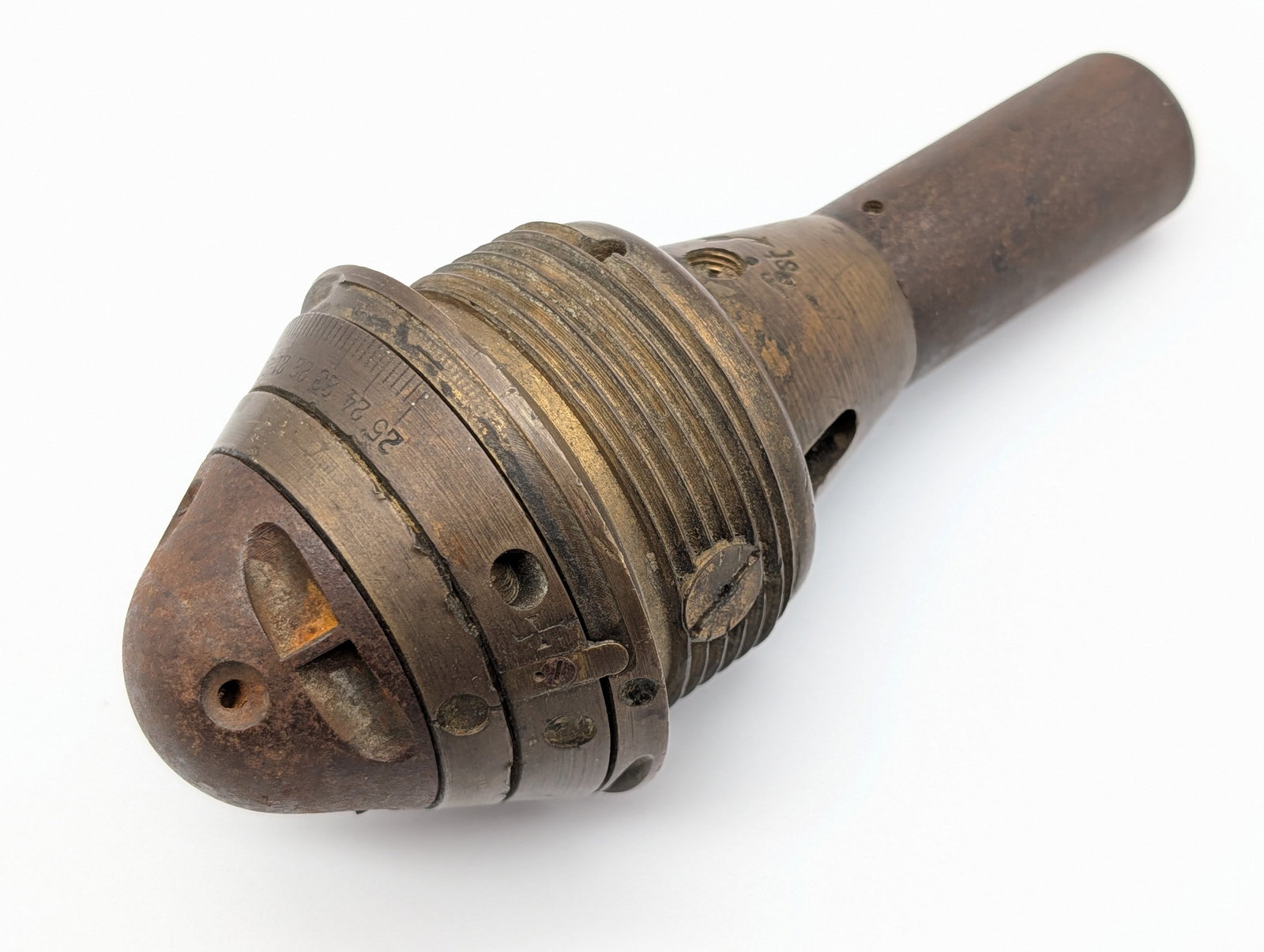 WWI German 1918 Artillery Shell Fuse: Fuse is marked Z.sum W.M. 1918, and is in good aged condition with tarnishing on the brass and light dings from handling and age. Measures 6-1/4in long. Ref #: 6536