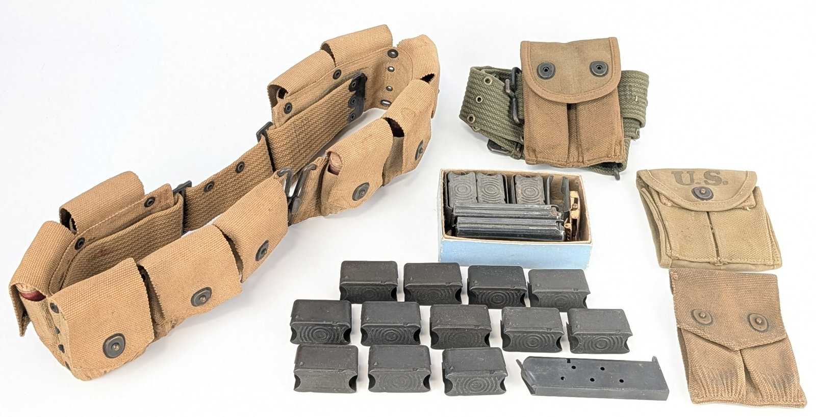 US Military M1 Carbine Mags, M1 Garand Clips, & GI Belts: Pieces are in overall good condition with scratches, staining, and other wear from use and age. Ref #: 6439