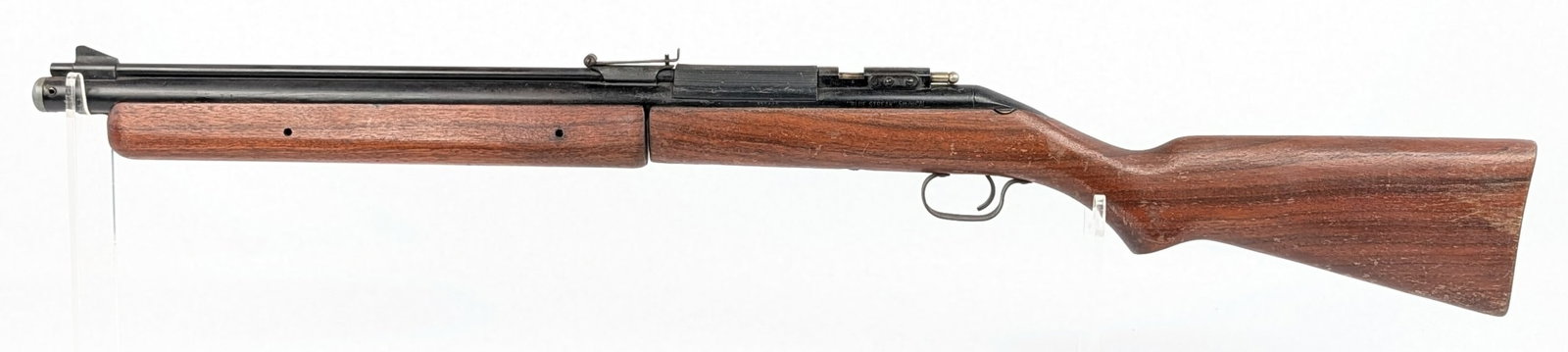 Sheridan Blue Streak 5mm Pellet Air Rifle: Rifle is in good used condition with scattered scuffs and scratches on the barrel and receiver, and finish wear on the stock from use and handling. Ref #: 6021