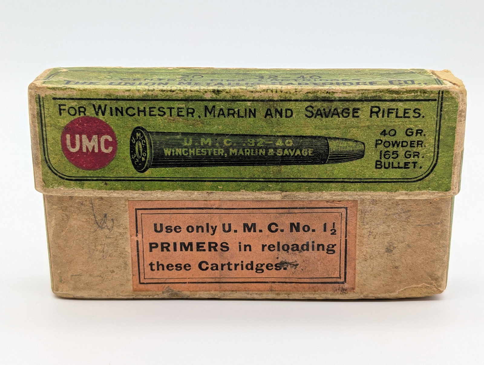 Full Remington UMC Black Powder .32-40 Cartridge Box: Box is in good condition with some paper tears, edge wear, and other wear from storage and age.