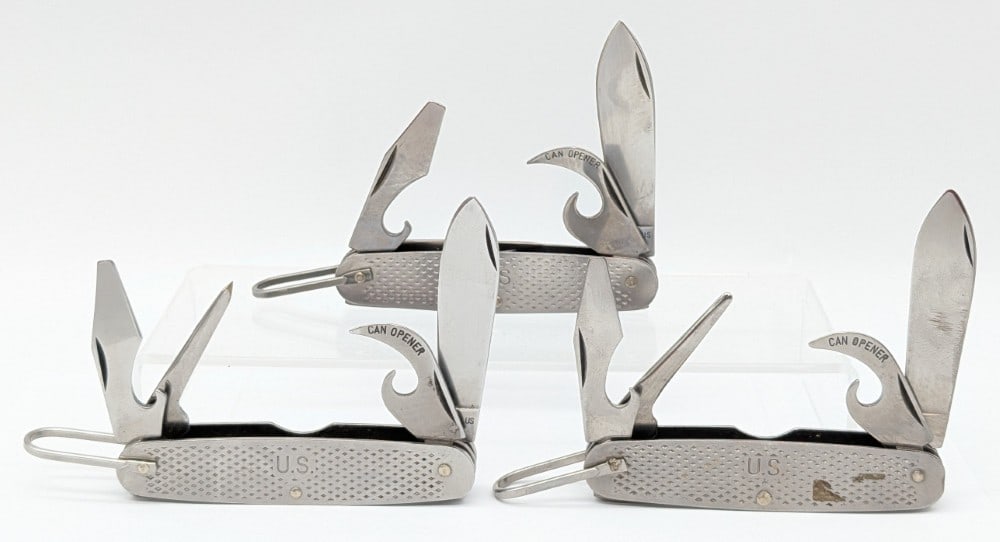(3) Camillus US Army Metal Utility Knives: Knives are in nice condition with light scuffs from use and handling. Overall measures in when closed.