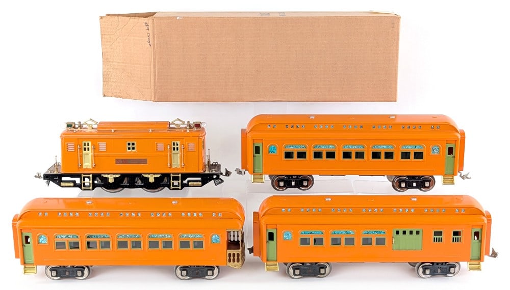 Williams Lionel No. 9E Locomotive with Passenger Cars: Williams reproduction standard gauge Lionel No. 9E locomotive with passenger cars. The locomotive and cars have some dust, minor rub marks, and light wear from run time and display. The cars and loco 