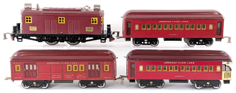 Prewar American Flyer Wide Gauge 4019 Maroon Electric Locomotive w/ Passenger Cars: Prewar American Flyer wide gauge 4019 Maroon electric locomotive with three maroon passenger cars. The locomotive was possibly restored and the one car roof restored. The set shows some paint loss and