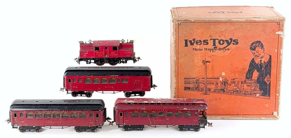 Prewar Ives #703 Red Passenger Set w/ Box: Prewar Ives standard gauge #703 red passenger car set with the original box. The set includes a 3242 electric loco, 187 baggage/Buffet, 188 Parlor car, and 189 observation car. The two cars have repai