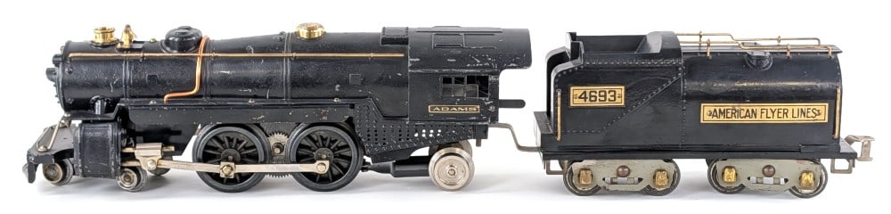 American Flyer 4692 Locomotive w/ Adams Plates & 4693 Tender: Prewar American Flyer standard gauge 4692 steam locomotive (with Adams plates) and 4693 tender. Overall good condition with expected paint loss and wear from age.