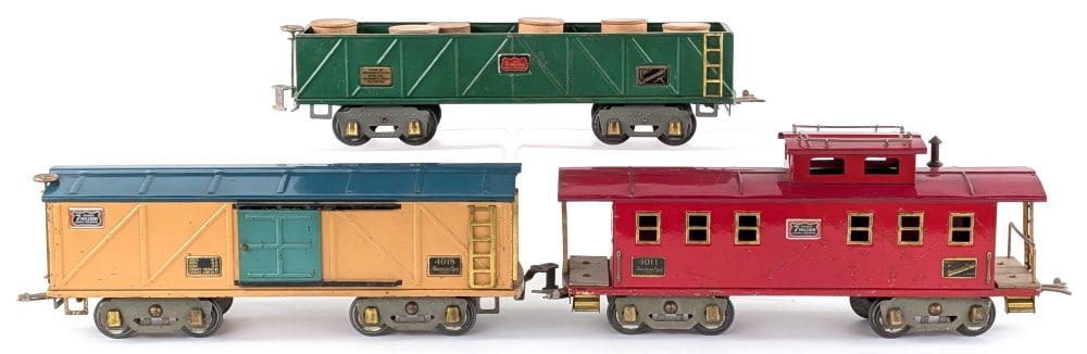 American Flyer 4011 Caboose, 4017 Gondola, 4018 Boxcar: Prewar American Flyer wide gauge 4011 caboose, 4017 gondola, and 4018 boxcar. The cars show some light paint loss and play wear.