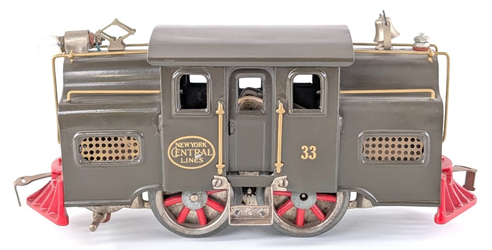 Restored Lionel No. 33 New York Central Lines Electric Locomotive: Restored Lionel No. 33 New York Central Lines electric locomotive. The locomotive has a nice restoration. It does have dust from display and a small knick on the NYC decal.