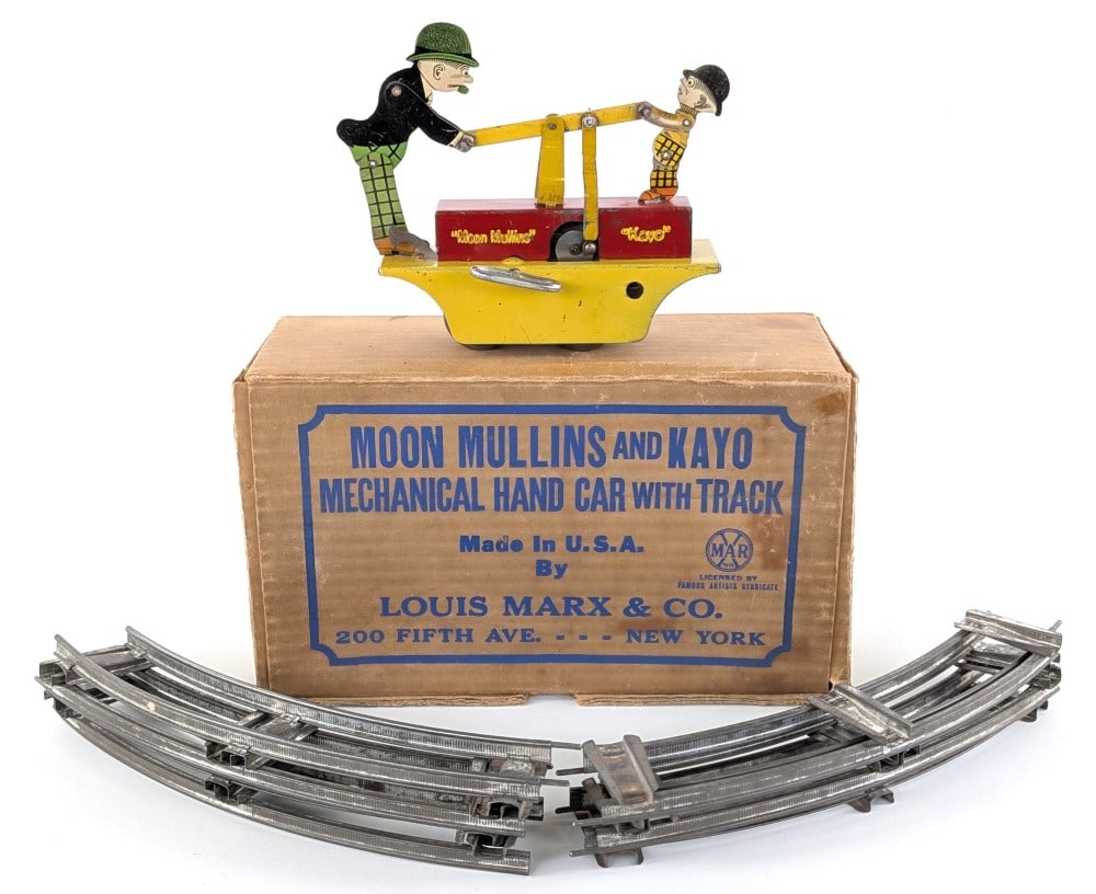 Marx Moon Mullins and Kayo Mechanical Hand Car w/ Track In Box: Marx Moon Mullins and Kayo mechanical hand car with curve track in the original box. The set also comes with the instructions sheet. The windup mechanism works as it should. The set box shows staining