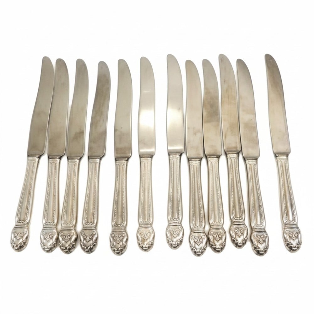 12 National Sterling Dinner Knives: 12 National Sterling Dinner Knives. 6 Oz. Sterling Knives. Knives are Weighed as 1/2 Oz.