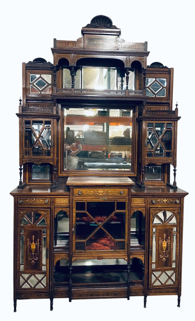 Antique Rosewood and Inlaid Parlor Cabinet: Antique Rosewood and Inlaid Parlor Cabinet. Cabinet is Decorated with Various Inlays and Mirrors. Cabinet is in overall good condition with minor Trim Damage on Cabinet and Top Piece has been glued.