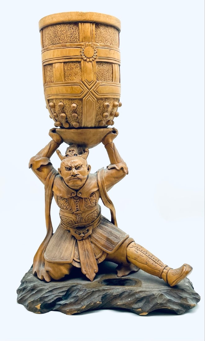 Antique Hand Carved Japanese Warrior Carrying Basket: Antique Hand Carved Japanese Warrior Carrying Basket. Figure is Signed on Bottom of stand and is in overall good condition foot has some damage. Measures 12? tall