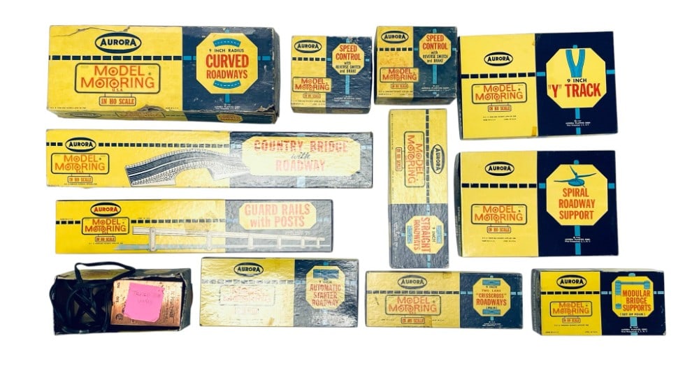 Aurora HO Model Motoring Accessories: Aurora HO Model Motoring Accessories. Accessories include Curved Roadways, Guard Rails, ?Y? Track and more.