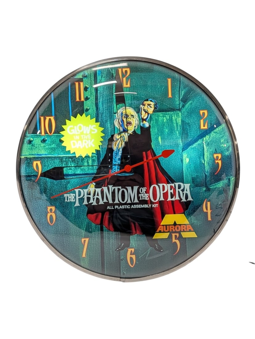 Aurora Monster Models Phantom Of The Opera Custom Lighted Pam Style Advertising Clock: Unique custom Aurora Glow In The Dark Monster Models Phantom Of The Opera Lighted glass PAM style advertising clock. It features a metal can, glass face, and outer curved glass. Appears to be in very