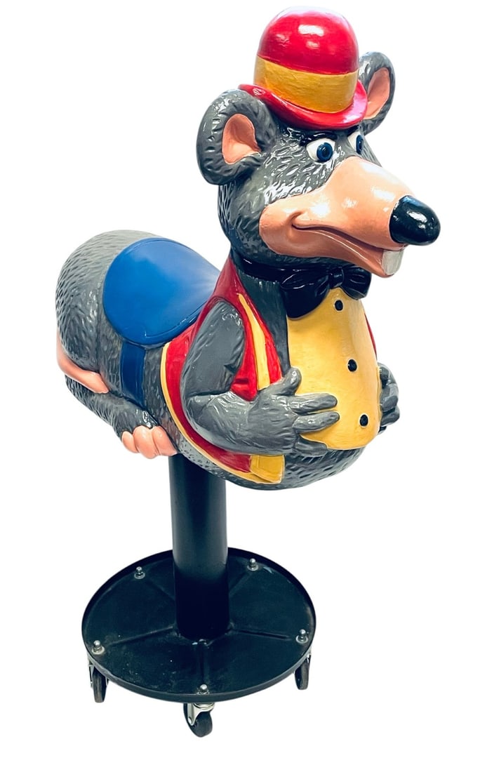 Chuck E. Cheese Fiberglass Mascot Statue: Chuck E. Cheese Fiberglass Mascot Statue. Statue is in Excellent Condition with no Paint Loss and Attached to Rolling Chair. Measures 27? x 15? x 42