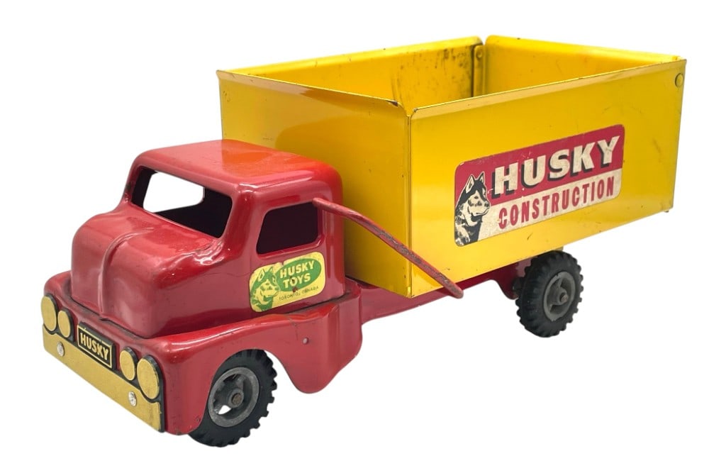 Husky Toys Pressed Steel Construction Truck: Husky Toys Pressed Steel Construction Truck. Truck is in overall good condition with some Ware and some rust spots. Measures 12 1/2? x 6? x 5 1/4