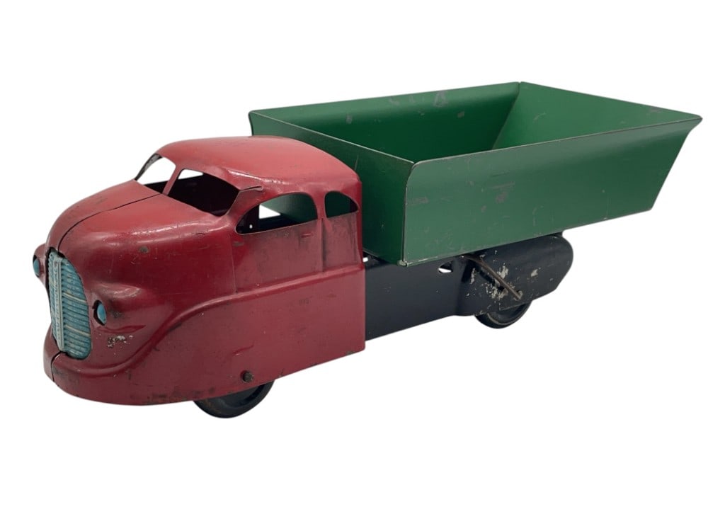 Vintage Wyandotte Pressed Steel Toy Dump Truck: Vintage Wyandotte Pressed Steel Toy Dump Truck. Pressed Steel has Scuffs and Measures 13? x 5 1/2? x 4