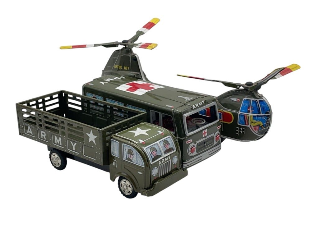 (3) Vintage U.S Army Tin Litho Trucks and Helicopter: (3) Vintage U.S Army Tin Litho Trucks and Helicopter. U.S Army Carrier, Medical Army Truck, and Helicopter. Vehicles have some Scuffs and Damage. Measures 13? and 9? and 13?.