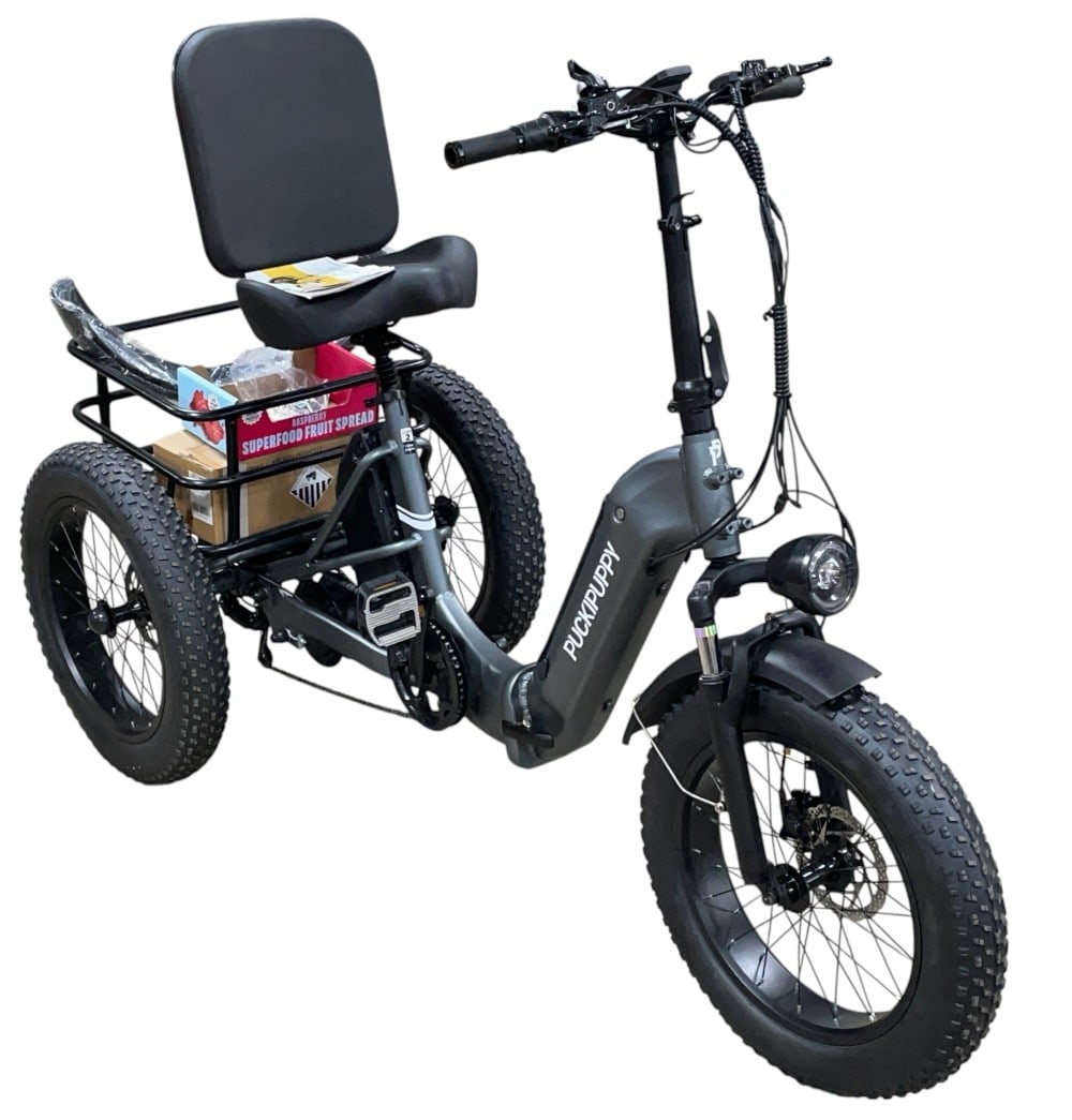 New Puckipuppy Electric Trike Bicycle: New Puckipuppy Electric Trike Bicycle. Bike is Class 2 750W 15mph with Extra Battery. Missing Brackets for back Wheel Covers. Works and Drives