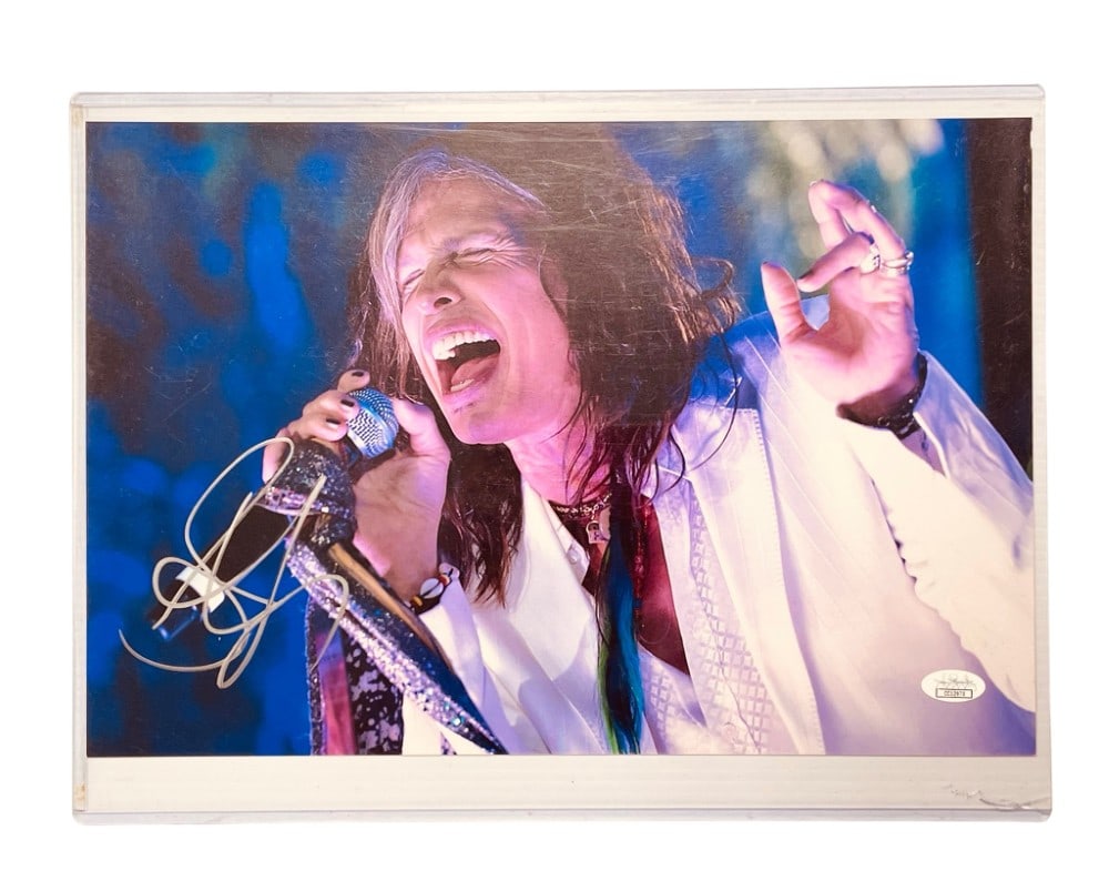 Steven Tyler Signed Colored Photograph: Steven Tyler Signed Colored Photograph. Photograph is Signed in Silver Marker and Authenticated by JSA. Measures 15? x 10