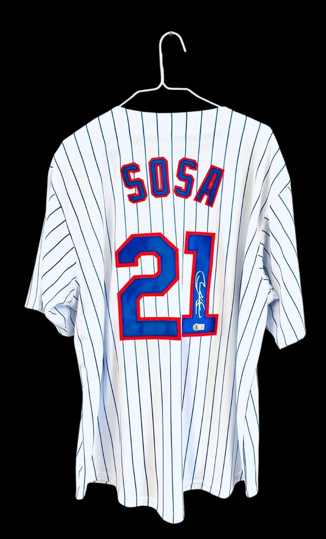 Sammy Sosa Signed Chicago Cubs Jersey: Sammy Sosa Signed Chicago Cubs Jersey. Jersey is Signed in Silver Marker and Beckett Authenticated. XL Jersey