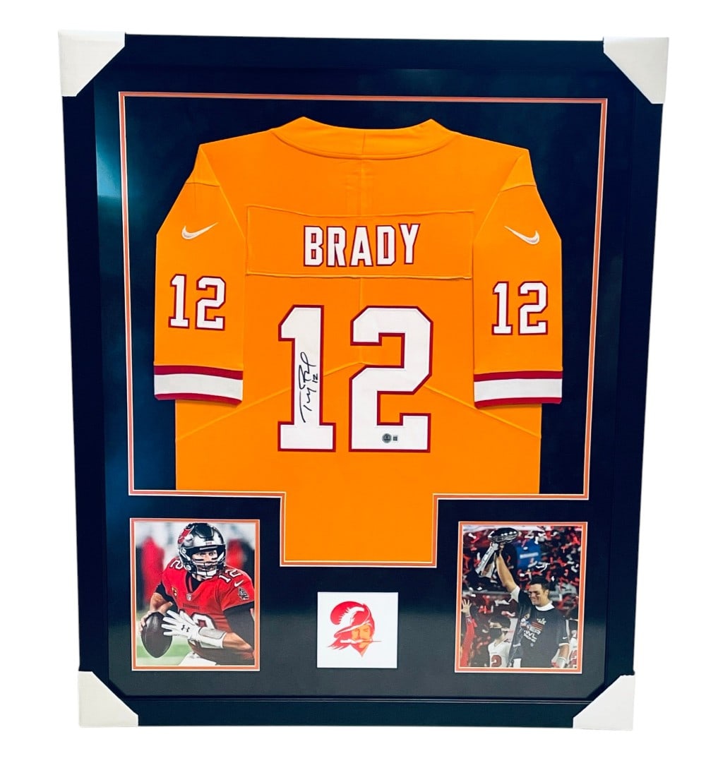 Tom Brady Signed Tampa Bay Buccaneers Jersey: Tom Brady Signed Tampa Bay Buccaneers Jersey. Jersey is Framed and Matted with Signed in Black Marker. Beckett Authenticated and Measures 35 1/2? x 43