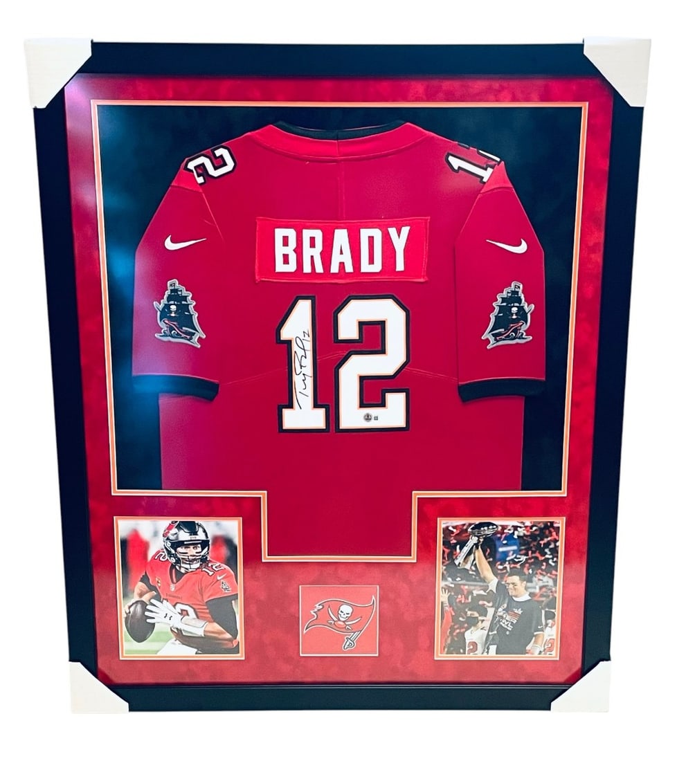 Tom Brady Signed Tampa Bay Buccaneers Jersey: Tom Brady Signed Tampa Bay Buccaneers Jersey. Jersey is Framed and Matted with signed in Black Marker. Beckett Authenticated and Measures 35 1/2? x 43