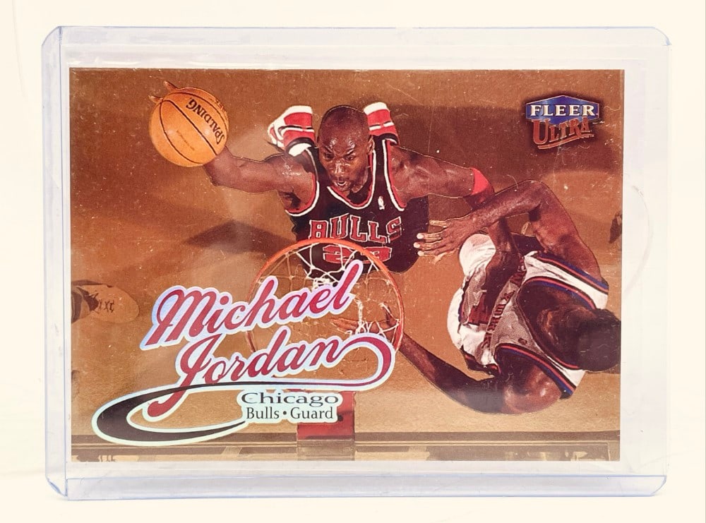 1998-99 Fleer Ultra Michael Jordan Card #85G Gold Medallion Edition Card: 1998-99 Fleer Ultra Michael Jordan Card #85G Gold Medallion Edition Card. Card has some Edge-Ware.