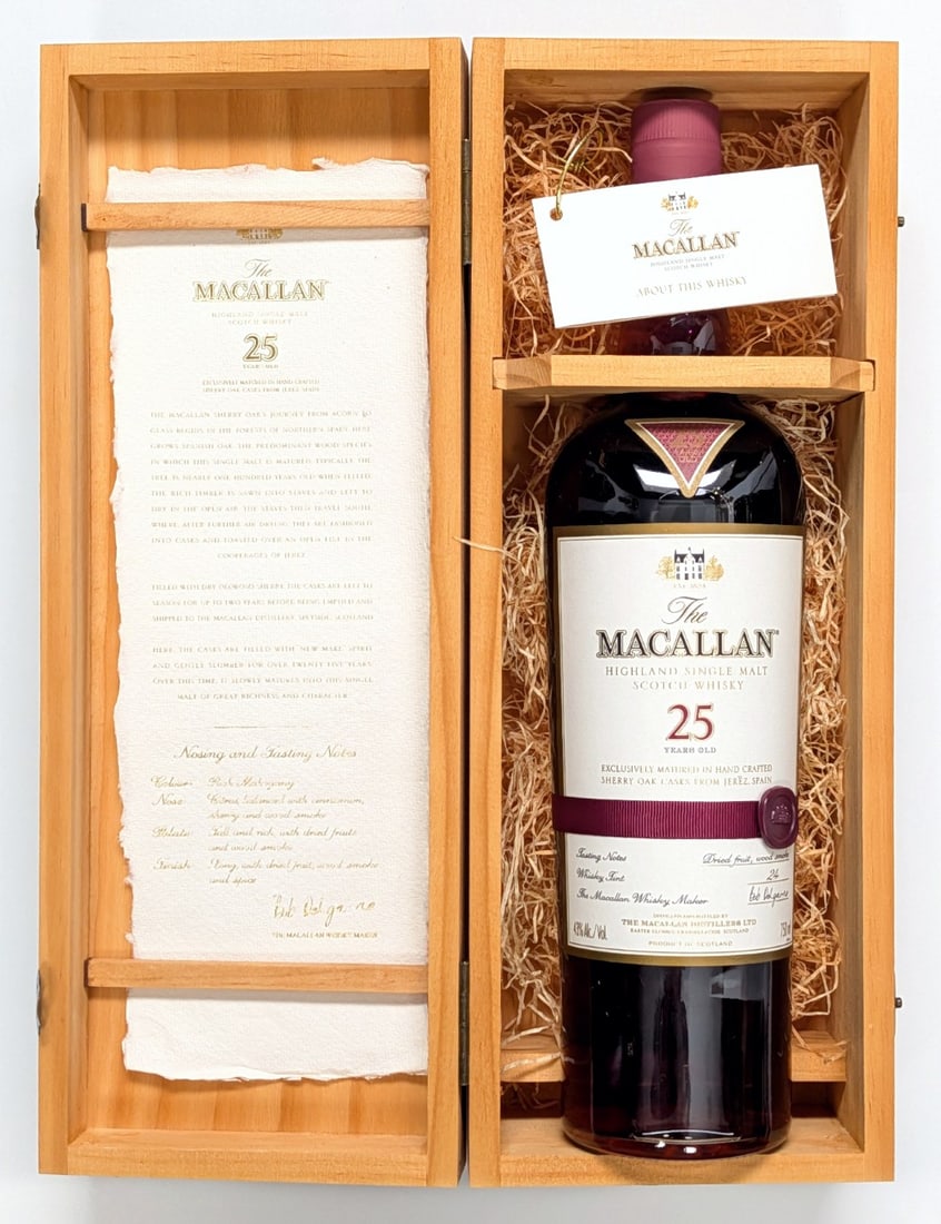 The Macallan 25 Year Old Single Highland Malt Scotch-Whiskey Sealed 750mL Bottle w/ Case: The Macallan 25 Year Old Single Highland Malt Scotch-Whiskey Sealed 750mL Bottle w/ Case. Bottle comes in original case with included papers and hang tag.? This retails for $2500 if you can find it.