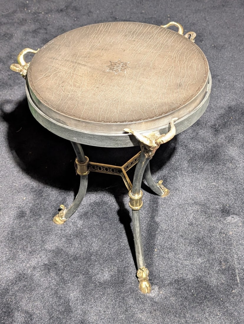 1990s Maitland Smith Iron and Brass Side Table: 1990s Maitland Smith Iron and Brass Side Table with Embossed Leather Top and Ornate Ram's Head Accents.? Very heavy, high quality, and expensive new.? This same table in used condition often sells