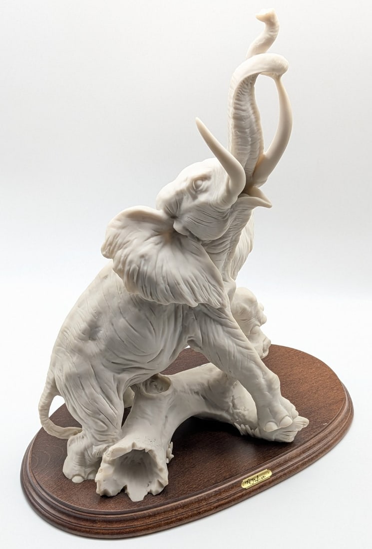 Roaring Elephant Resin Statue by A. Balcori: High End Roaring Elephant Resin Statue by A. Balcori.? 13 1/2" wide by 8" deep and 16" tall.? This is in very nice condition.?