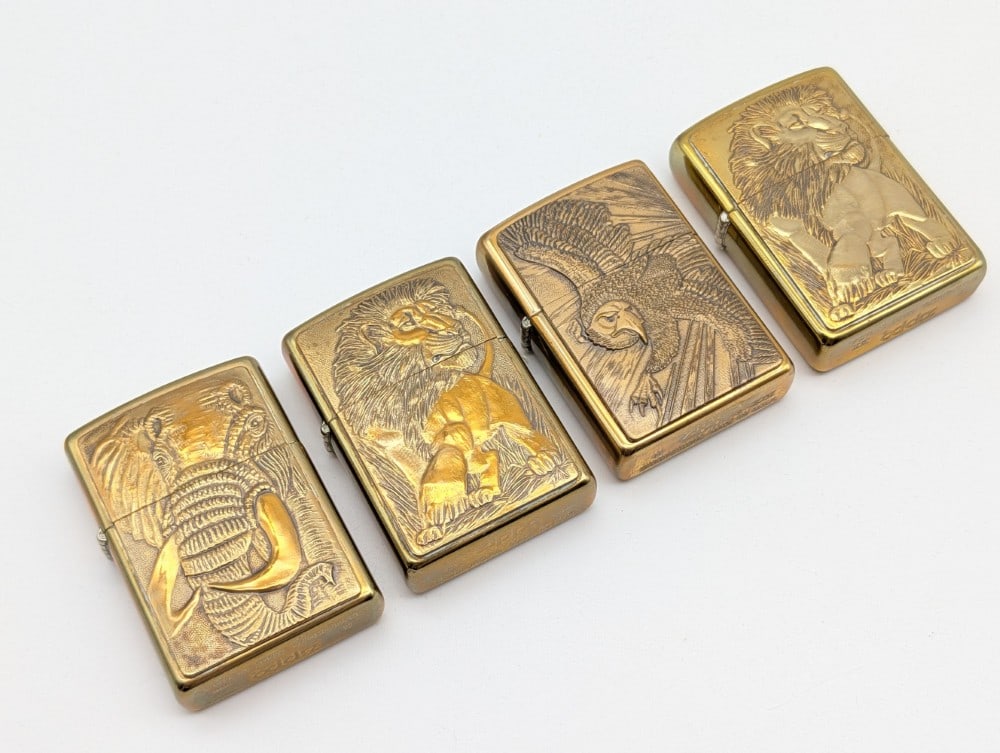 (4) Vtg Brass Animal Zippo Lighters: (4) Vtg Brass Animal Zippo Lighters ?Includes stamped images of an eagle, lions, and an elephants. Lighters are all in good condition with some scuffs from handling and age.