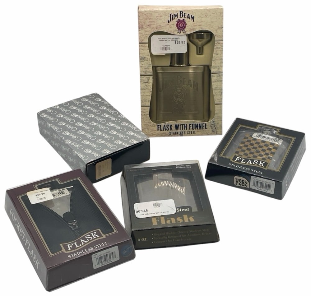 Various Stainless Steel Flasks in Boxes: Various Stainless Steel Flasks in Boxes. This includes a 7oz etched Jim Beam stainless steel flask with a funnel, a 6oz pocket flask features a decorative gold and black checkered pattern, a 6oz pocke