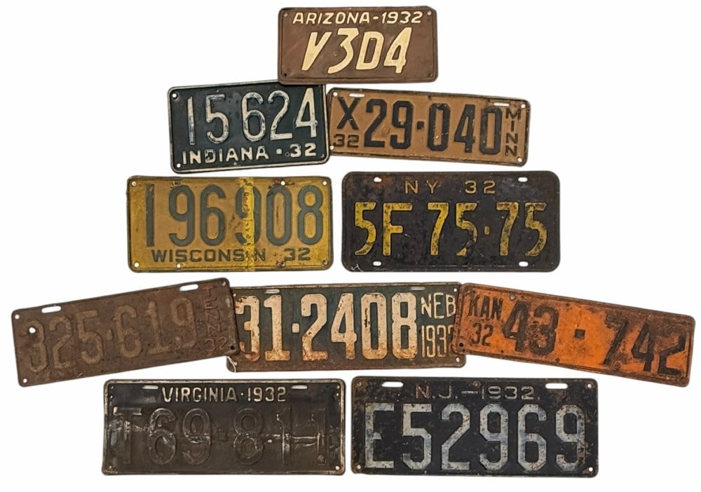 10 1932 Vehicle License Plates: 10 1932 Vehicle License Plates. This lot contains 1 1932 vehicle license plate from Kansas measuring approximately 14" by 4", 1 1932 Nebraska license plate measuring approximately 15" by 5", 1 1932 Mi