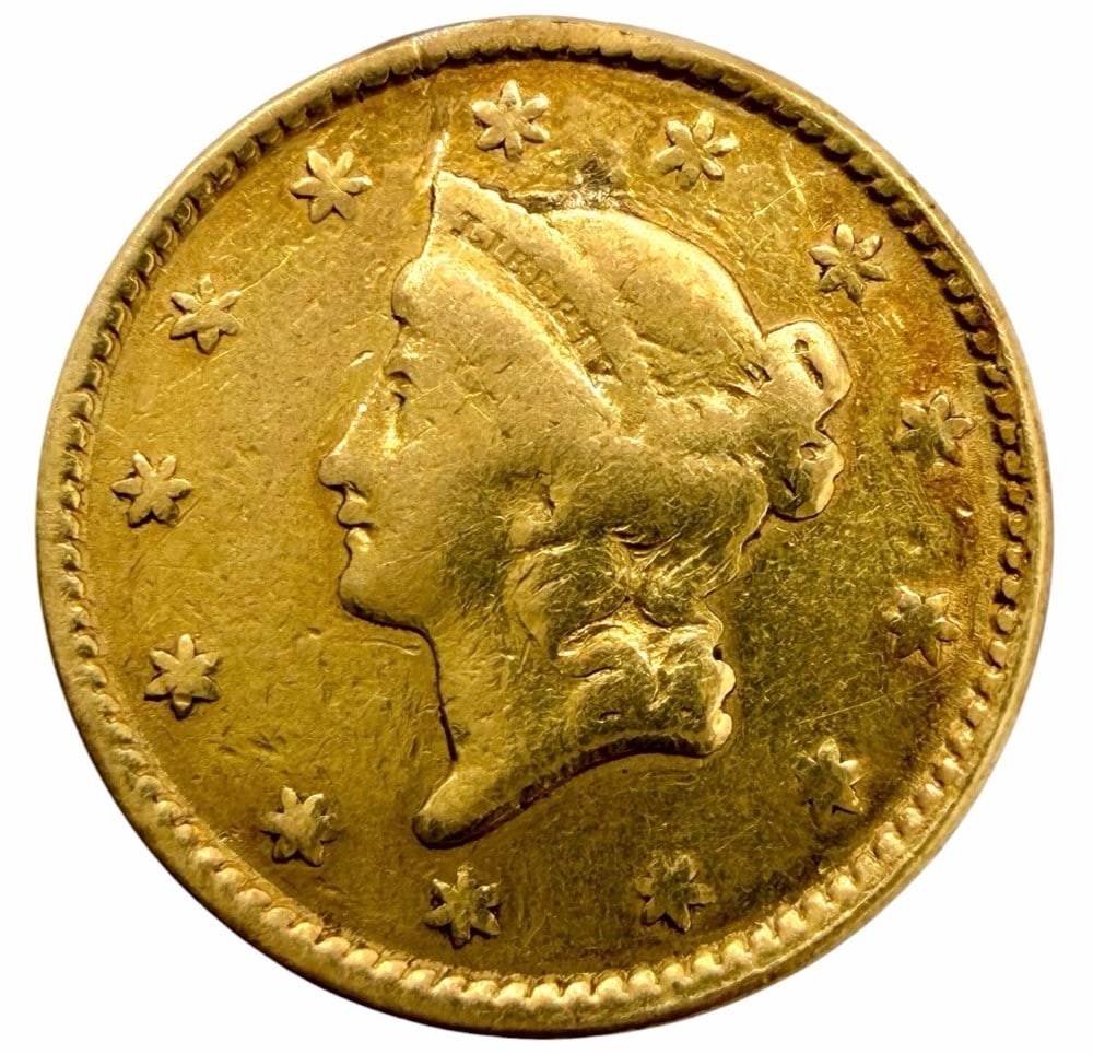 1851 U.S. Liberty Head $1 Gold Piece: 1851 U.S. Liberty Head $1 Gold Piece. Average circulated condition coin. Contains .0484 troy ounces of pure gold