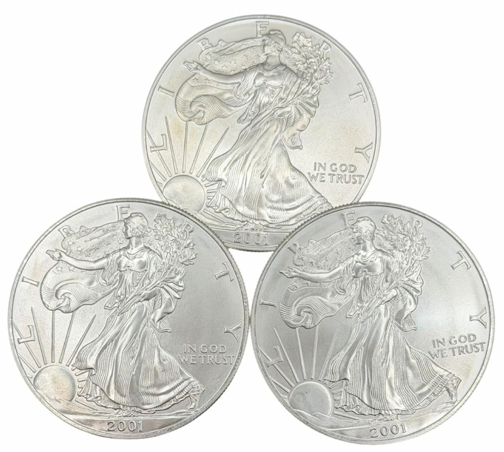 (3) 2001 United States Silver American Eagle One Ounce .999 Fine Silver Dollars, Uncirculated: (3) 2001 United States Silver American Eagle One Ounce .999 Fine Silver Dollars, these coins are uncirculated. ?Total weight 3 troy ounces of .999 fine silver