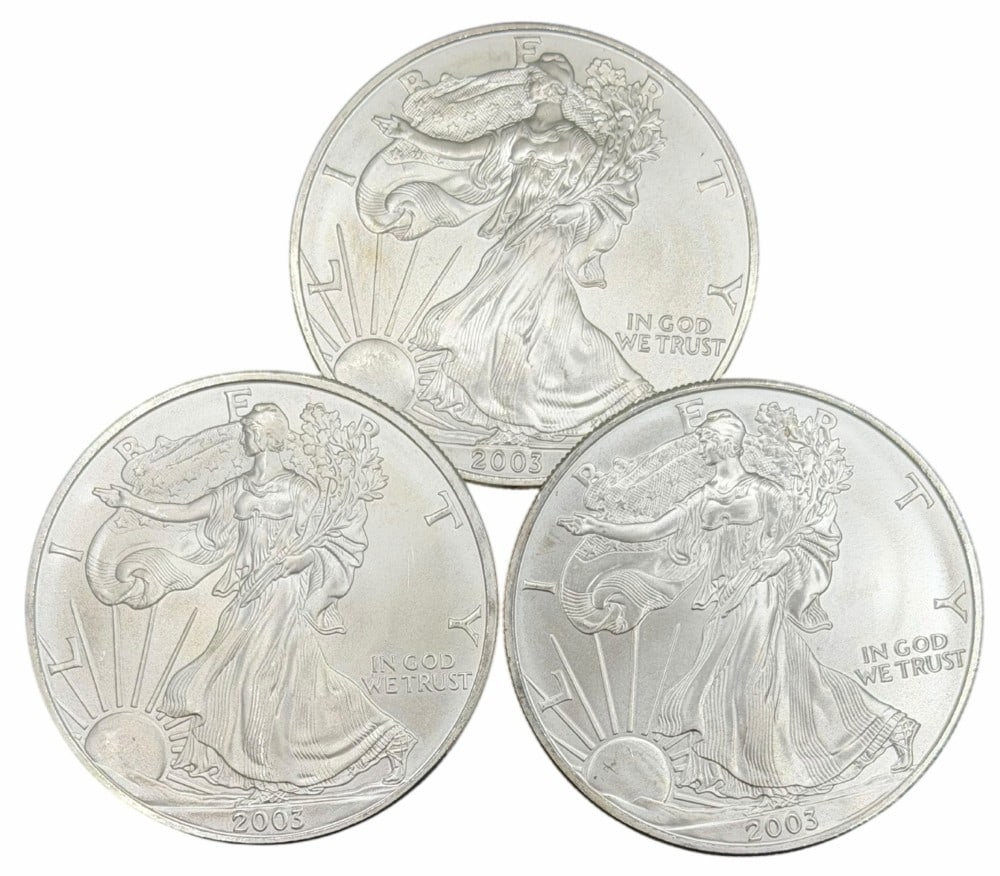 (3) 2003 United States Silver American Eagle One Ounce .999 Fine Silver Dollars, Uncirculated: (3) 2003 United States Silver American Eagle One Ounce .999 Fine Silver Dollars, these coins are uncirculated. ?Total weight 3 troy ounces of .999 fine silver