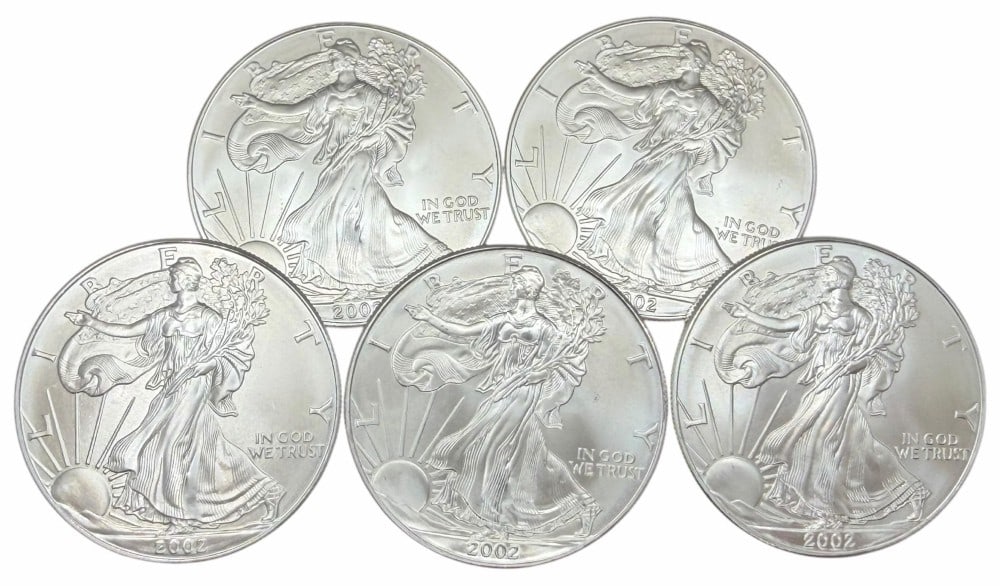 (5) 2002 United States Silver American Eagle One Ounce .999 Fine Silver Dollars, Uncirculated: (5) 2002 United States Silver American Eagle One Ounce .999 Fine Silver Dollars, these coins are uncirculated. ?Total weight 5 troy ounces of .999 fine silver