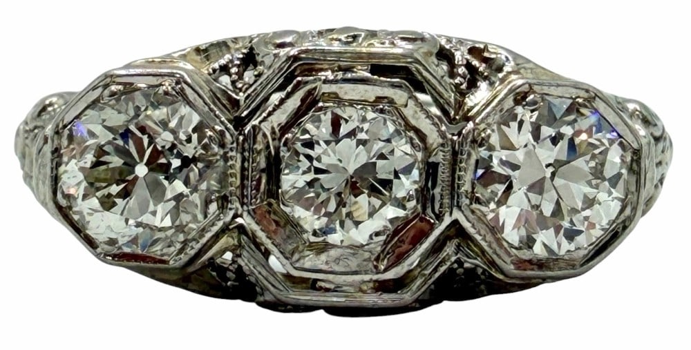 18K White Gold 1ctw Old European Cut Diamond Ring, Size 6.75: 18K White Gold 1ctw Old European Cut Diamond Ring, Size 6.75. This gorgeous ring has three old European cut diamonds that are mounted throughout the center of the ring with a weight of 1.00ctw. The ri