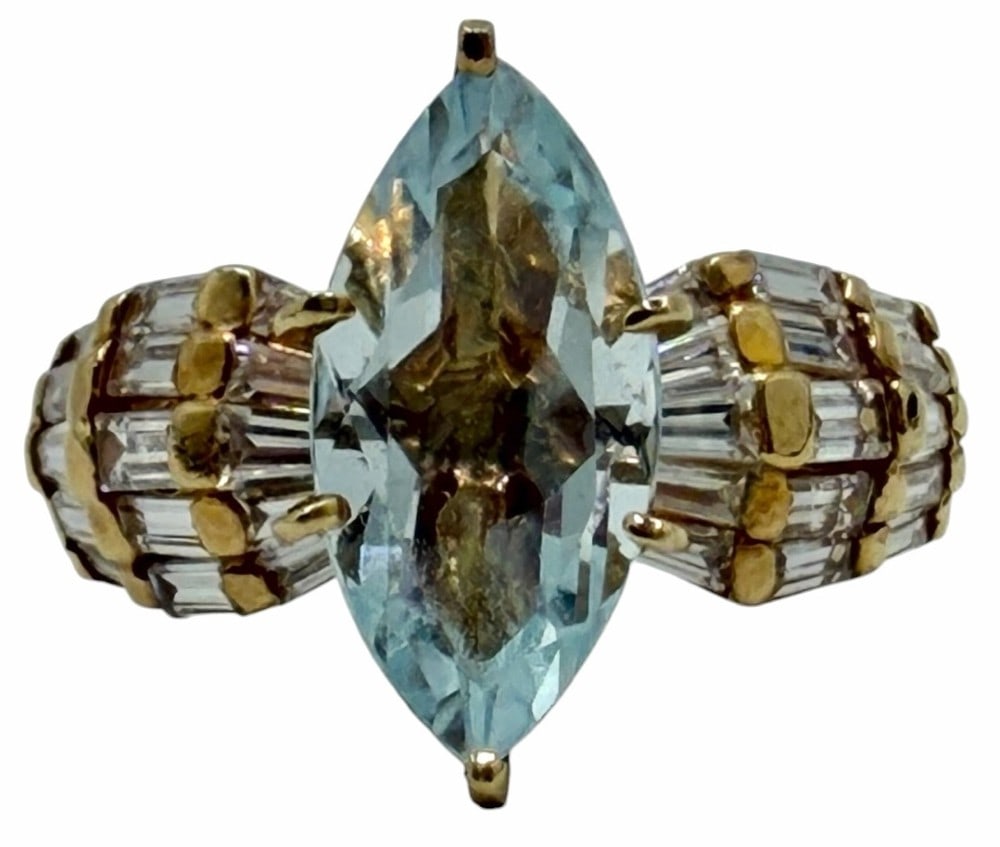 14K Yellow Gold Marquise Cut Aquamarine Fashion Ring, Size 6: 14K Yellow Gold Marquise Cut Aquamarine Fashion Ring, Size 6. This beautiful ring features a marquise-cut aquamarine diamond in the center with a surface measurement of approximately 13.65mm x 6.75mm.