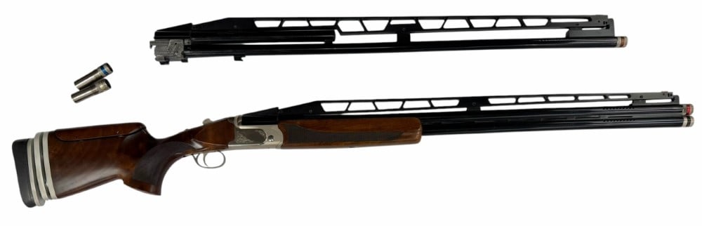 TriStar Arms TT-15 CTA Deluxe 12Ga Over/Under Shotgun Combo: TriStar Arms TT-15 CTA Deluxe 12Ga Over/Under Shotgun Combo. The TriStar Arms TT-15 CTA Deluxe 12Ga Over/Under Shotgun Combo is in very nice used condition. The barrels measure 32 (over/under) and 34 