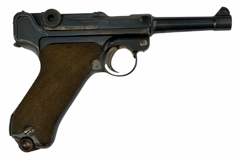 1920's DWM German Luger .30 Luger Caliber Semi Automatic Pistol: 1920's DWM German Luger .30 Luger Caliber Semi Automatic Pistol.? The DWM 1920's German Luger is in very nice used condition.? Barrel measures 4 inches in length.? Bore is clean.? Blueing is strong wi