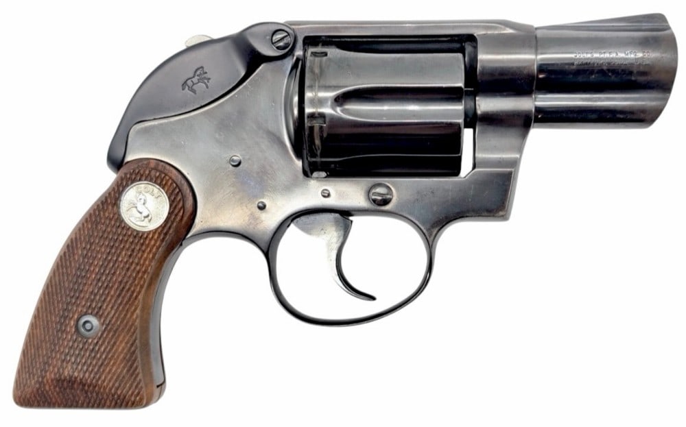 Colt Detective Special Hammerless .38 Special Revolver: Colt Detective Special Hammerless .38 Special Revolver, The vintage Colt Det Spl is in nice used condition.? Barrel measures 2 1/8 inches in length.? Tip of barrel obtains holster wear.? Colt grips ar