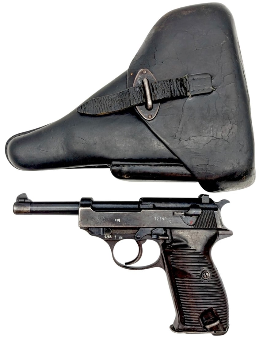 WWII German Spreewerk P.38 9mm Pistol w/ Holster: WWII German Spreewerk P.38 9mm Pistol w/ Holster.? Pistol comes with a period correct magazine, and is marked on the right side of the slide with the WaffenAmt 88. The holster is in very nice conditio